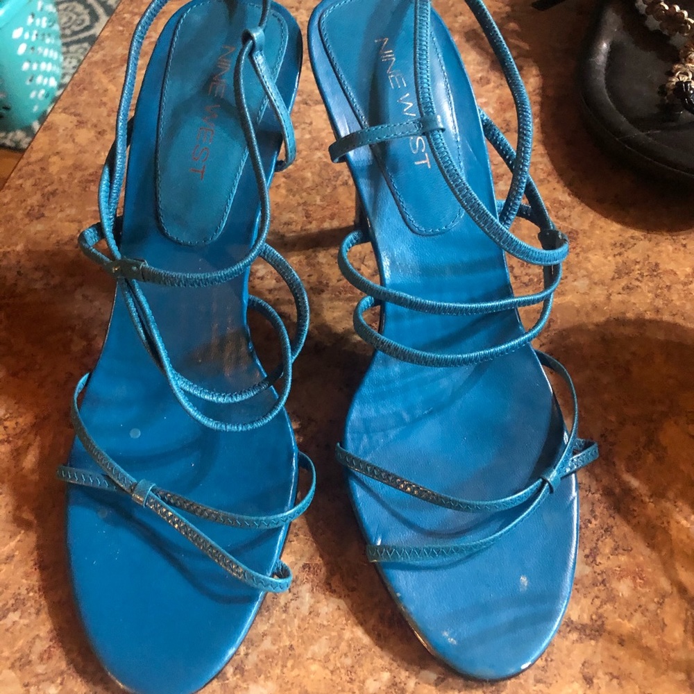 Strapped turquoise heels. Never worn
